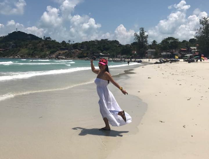 Koh Samui beach with palm trees and tropical sea