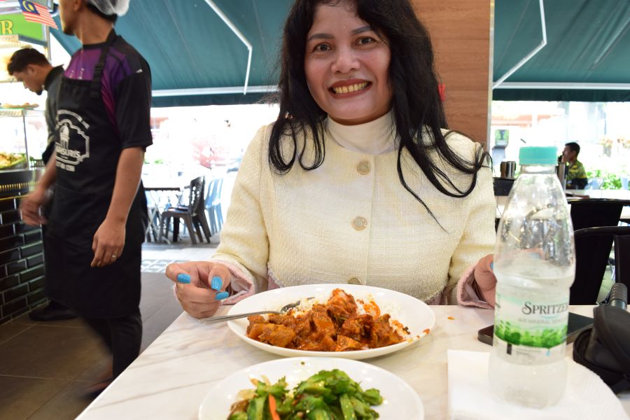 Food scene in Kuala Lumpur with urban dining atmosphere